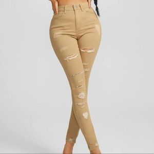Khaki ripped skinny jeans